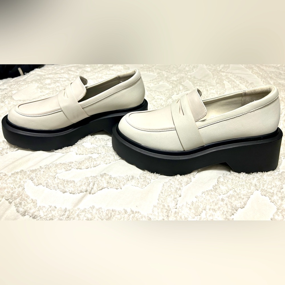 Platform loafers.Brand new, never worn.White/beige with black platform. Size 8.5